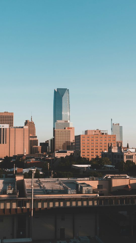 brown concrete building under blue sky